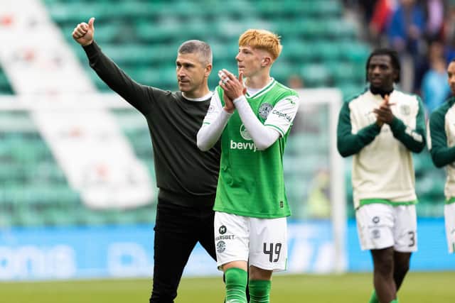 Hibs manager Nick Montgomery and Rory Whittaker applaud fans after being St Johnstone.