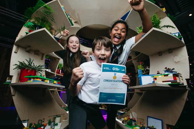Kirkhill Primary pupils Kathryn Thompson, Dillon Burns, and Saanvi Dey. Picture: Andrew Cawley