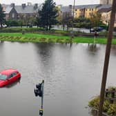 A car trapped due to heavy flooding in Granton, Edinburgh. Picture: John Devlin