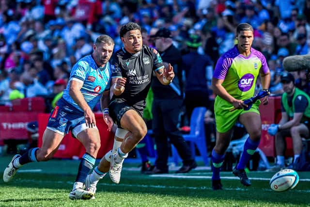 Glasgow Warriors' Sione Tuipulotu competes with Willie Le Roux of the Vodacom Bulls during the BKT United Rugby Championship at Loftus Versfeld which saw Glasgow pick up two bonus points.  (Photo by SteveHaagSports/INPHO/Shutterstock)