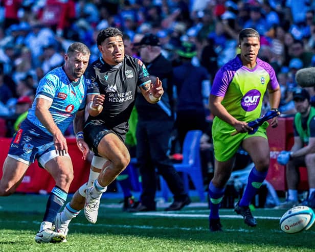 Glasgow Warriors' Sione Tuipulotu competes with Willie Le Roux of the Vodacom Bulls during the BKT United Rugby Championship at Loftus Versfeld which saw Glasgow pick up two bonus points.  (Photo by SteveHaagSports/INPHO/Shutterstock)
