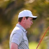 Frustration is etched on Bob MacIntyre's face as he walks off the 18th tee during the third round of the Hero Dubai Desert Classic at Emirates Golf Club. Picture: Ross Kinnaird/Getty Images.