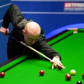 Anthony McGill in action in yesterday’s gripping contest at the Crucible Theatre, the Scot losing in a final-frame decider. Picture: Zac Goodwin/Getty