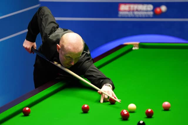 Anthony McGill in action in yesterday’s gripping contest at the Crucible Theatre, the Scot losing in a final-frame decider. Picture: Zac Goodwin/Getty