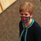 First Minister Nicola Sturgeon leaves after making a statement to the Scottish Parliament. Photo by Russell Cheyne/Getty Images