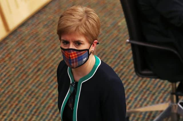 First Minister Nicola Sturgeon leaves after making a statement to the Scottish Parliament. Photo by Russell Cheyne/Getty Images