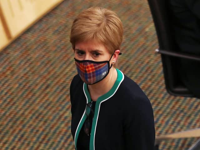 First Minister Nicola Sturgeon leaves after making a statement to the Scottish Parliament. Photo by Russell Cheyne/Getty Images