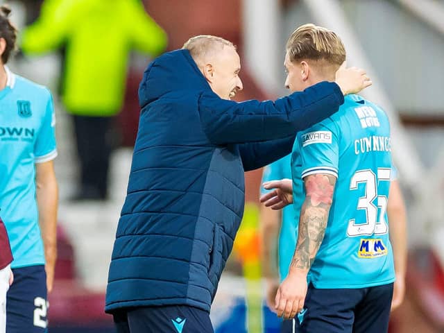 Leigh Griffiths congratulates Jason Cummings on his equaliser against Hearts for Dundee.