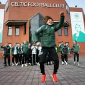 Kyogo Furuhashi celebrates as fans gather at Celtic Park after they secure the 2022/23 league title. Photo by Ewan Bootman / SNS Group