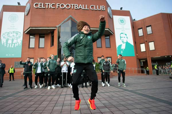Kyogo Furuhashi celebrates as fans gather at Celtic Park after they secure the 2022/23 league title. Photo by Ewan Bootman / SNS Group