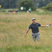 Bryson DeChambeau plays out of the deep rough on the 15th hole during the first round of the 149th Open at Royal St George's. PIcture: Picture: Paul Ellis/AFP via Getty Images.