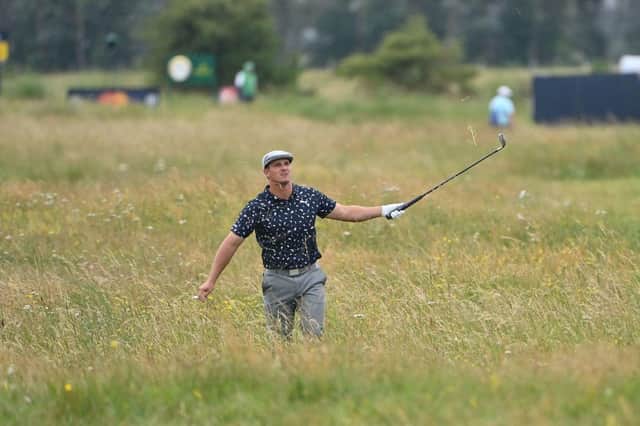 Bryson DeChambeau plays out of the deep rough on the 15th hole during the first round of the 149th Open at Royal St George's. PIcture: Picture: Paul Ellis/AFP via Getty Images.