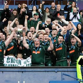 Hawick players celebrate winning the Scottish Cup last season.
