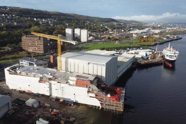 The as-yet unfinished 802 ferry in the foreground at the Ferguson Marine shipyard in Port Glasgow, which has been named the Glen Rosa. Picture: John Devlin