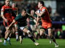 Leicester Tigers' stand-off Handre Pollard eyes up a tackle on Edinburgh's Emiliano Boffelli as the Scottish outfit crashed out of the Heineken Cup.