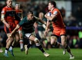 Leicester Tigers' stand-off Handre Pollard eyes up a tackle on Edinburgh's Emiliano Boffelli as the Scottish outfit crashed out of the Heineken Cup.