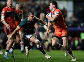 Leicester Tigers' stand-off Handre Pollard eyes up a tackle on Edinburgh's Emiliano Boffelli as the Scottish outfit crashed out of the Heineken Cup.
