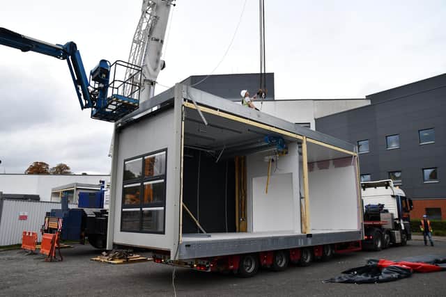 The first building components for the new National Treatment Centre arrived at the Larbert site in October 2022 - but the building is still not complete and open for use. Pic: Michael Gillen