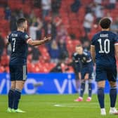 John McGinn and Che Adams are among eight Scotland one booking away from being suspended from a potential World Cup play-off final. (Photo by Alan Harvey / SNS Group)