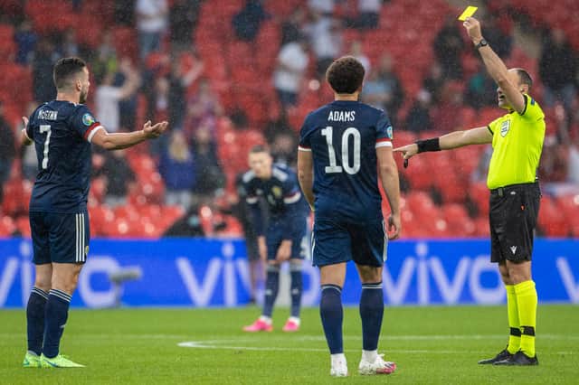 John McGinn and Che Adams are among eight Scotland one booking away from being suspended from a potential World Cup play-off final. (Photo by Alan Harvey / SNS Group)