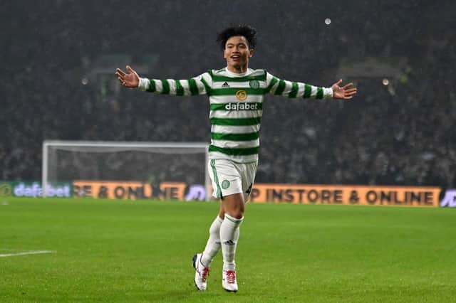 Reo Hatate celebrates his Old Firm double (Picture: John Devlin)