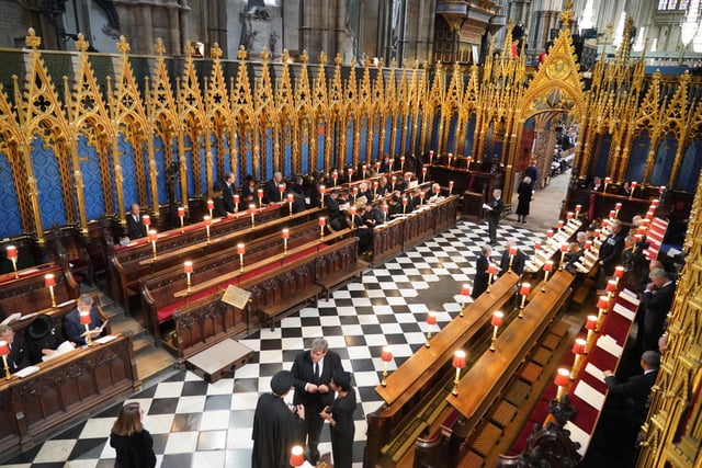 Guests take their seats at the State Funeral of Queen Elizabeth II, held at Westminster Abbey, London. Picture date: Monday September 19, 2022.
