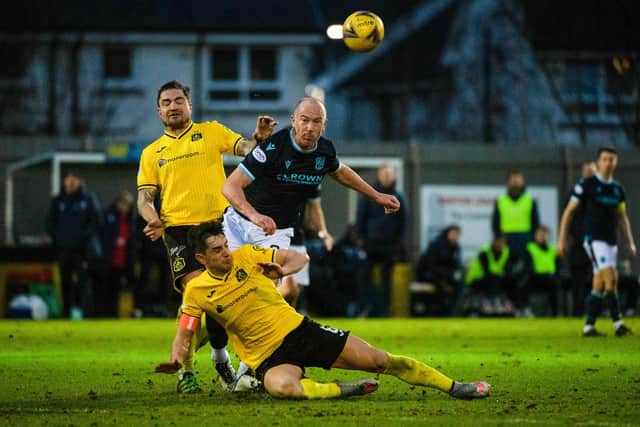 Dundee's Charlie Adam has a shot during the Scottish Cup tie against Dumbarton.