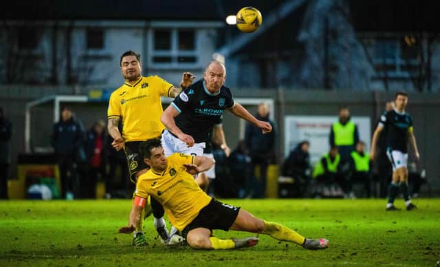 Dundee's Charlie Adam has a shot during the Scottish Cup tie against Dumbarton.