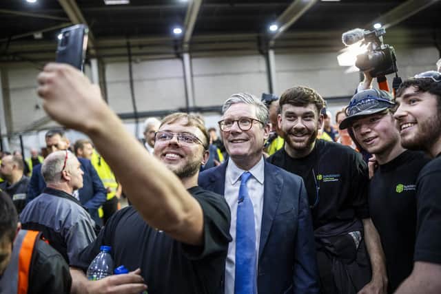 Prime Minister Sir Keir Starmer poses for pictures during a visit to Hutchinson Engineering in Widnes, Cheshire. Picture: James Glossop/The Times/PA Wire