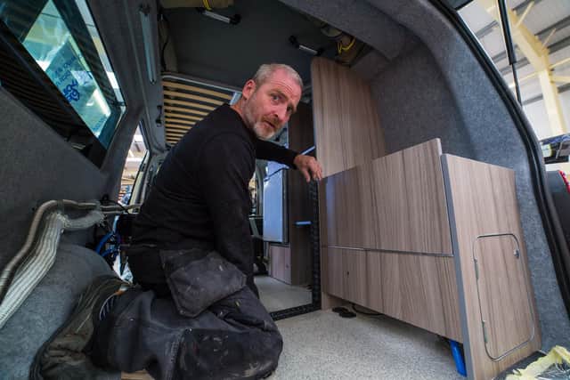 Colleague Ian Adkin getting to grips with one of the firm's VW T6 Transporter conversions. Picture: contributed.