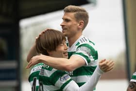 Celtic's Carl Starfelt (right) with team-mate Kyogo Furuhashi during a recent win over Kilmarnock.  (Photo by Craig Williamson / SNS Group)