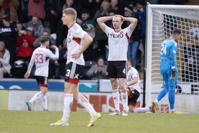 Aberdeen defender Liam Scales is dejected after St Mirren score their third in injury-time. (Photo by Alan Harvey / SNS Group)