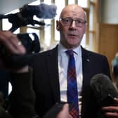 SNP leader John Swinney speaks to the media following First Minister's Questions at the Scottish Parliament. Picture: Jeff J Mitchell/Getty Images