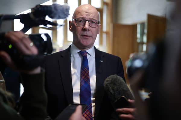 SNP leader John Swinney speaks to the media following First Minister's Questions at the Scottish Parliament. Picture: Jeff J Mitchell/Getty Images