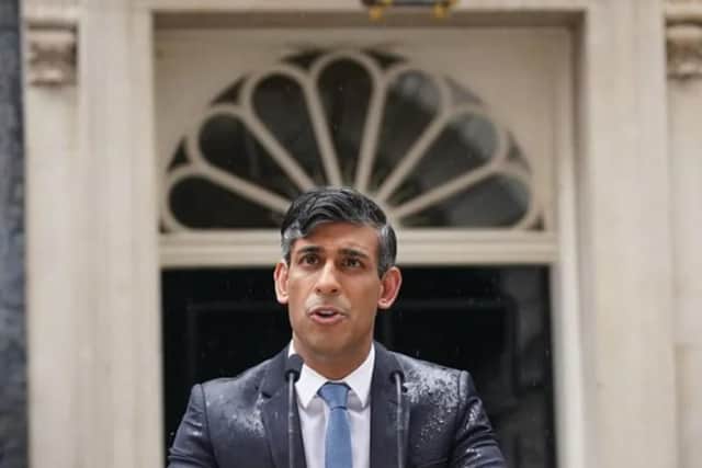 Rishi Sunak takes a soaking as he calls the election.