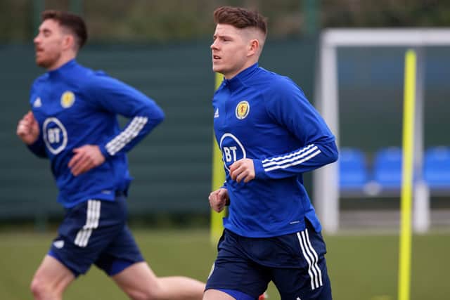 Hibs striker Kevin Nisbet (foreground) trains for the first time with his new Scotland teammates  (Photo by Craig Williamson / SNS Group)