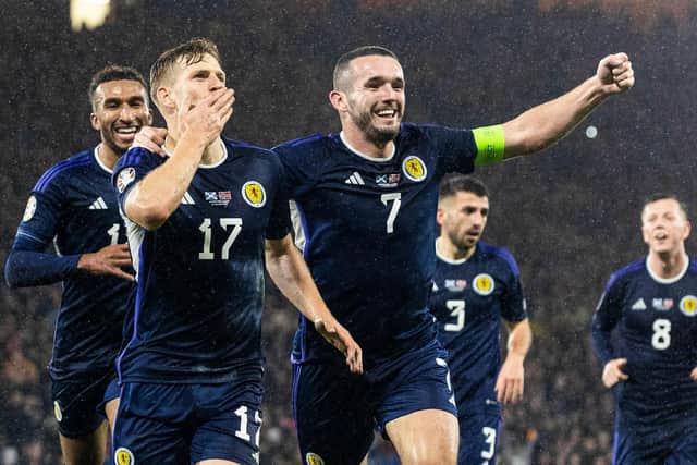 Scotland's Stuart Armstrong celebrates with John McGinn after scoring to make it 3-2 over Norway at Hampden. (Photo by Alan Harvey / SNS Group)