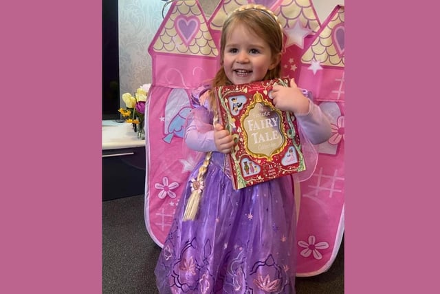 Three-year-old Aria seems to love her fairytales, especially Rapunzel.