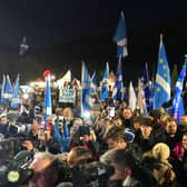 People attending a rally outside the Scottish Parliament in Edinburgh, as the SNP has announced new plans to introduce a bill to allow Scotland to decide on independence.