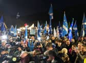 People attending a rally outside the Scottish Parliament in Edinburgh, as the SNP has announced new plans to introduce a bill to allow Scotland to decide on independence.