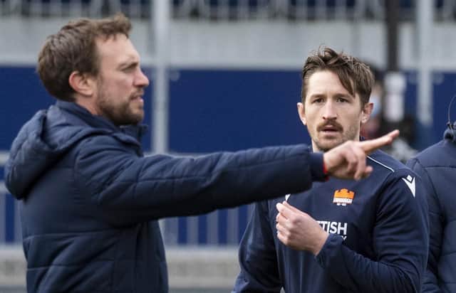Mike Blair, left, thinks departing scrum-half Henry Pyrgos has the attributes to be a coach. (Photo by Mark Scates / SNS Group)