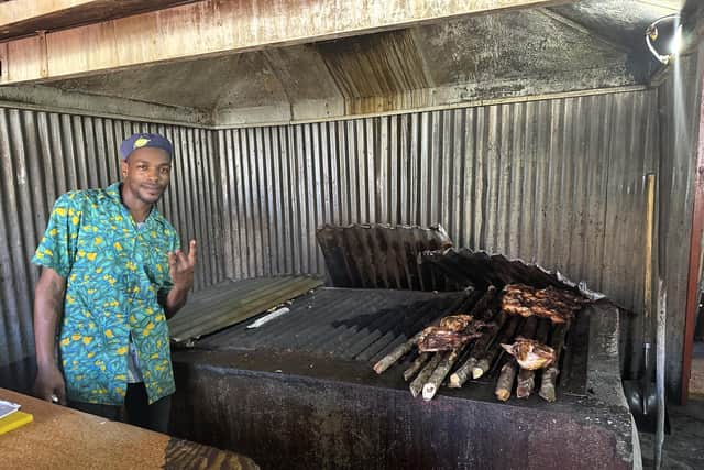 Jerk cooking at Scotchies Restaurant. Pic: Lauren Taylor/PA