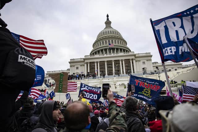 Supporters of Donald Trump storm the US Capitol in an attempt to stop the ratification of Joe Biden's election as US president (Picture: Samuel Corum/Getty Images)