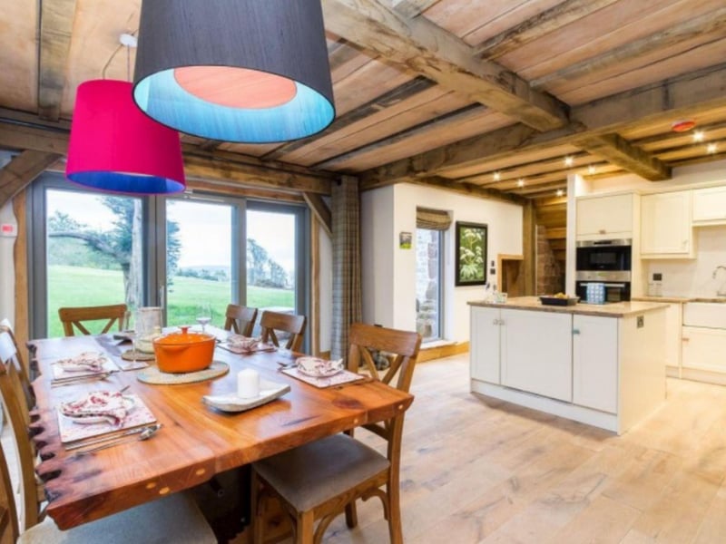 The spacious kitchen/diner comfortable sits eight people for meals.
