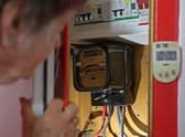 Many people who struggle to pay energy bills are forced to switch to pre-payment meters (Picture: Susannah Ireland/AFP via Getty Images)