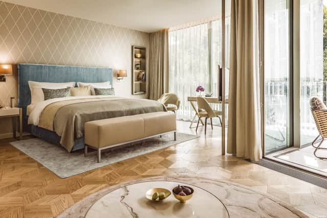 Floor to ceiling windows showcase lakeside vistas from the rooms at the Fontenay Hotel, Hamburg. Pic: Contributed