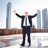 Prime Minister Boris Johnson arrives for a media interview at the Emirates Palace hotel in Abu Dhabi during his visit to the United Arab Emirates (UAE).