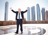 Prime Minister Boris Johnson arrives for a media interview at the Emirates Palace hotel in Abu Dhabi during his visit to the United Arab Emirates (UAE).