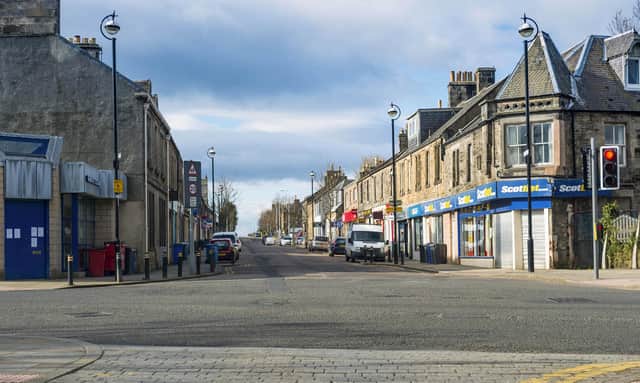 Like Loanhead town centre in April last year, streets all over Scotland, the UK and the world have been empty of people during the height of Covid lockdowns (Picture: Mark Scates/SNS Group)