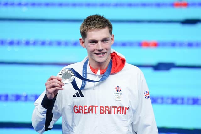 Great Britain’s Duncan Scott with his sliver medal after the Men’s 200m Individual Medley.